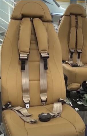 Crew seat restraint system with shoulder harness airbags (seats removed from aircraft) (Source: Daher TBM)