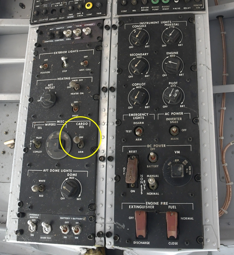 Figure 11. CARGO REL [cargo release] switch, as found post-accident, on the overhead panel of the occurrence helicopter. DC Power and Battery switches were selected OFF, post-accident, for safety reasons. (Source: TSB)