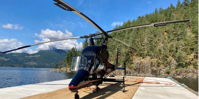 Figure 3. The occurrence helicopter on the fuel barge at Killam Bay (Source: Black Tusk Helicopter Inc.) 